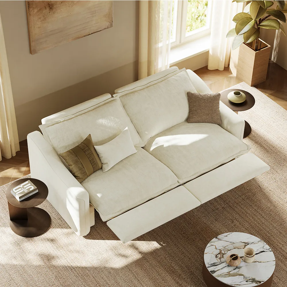 Modern beige power recliner sofa fully extended in a sunlit minimalist living room with artistic decor