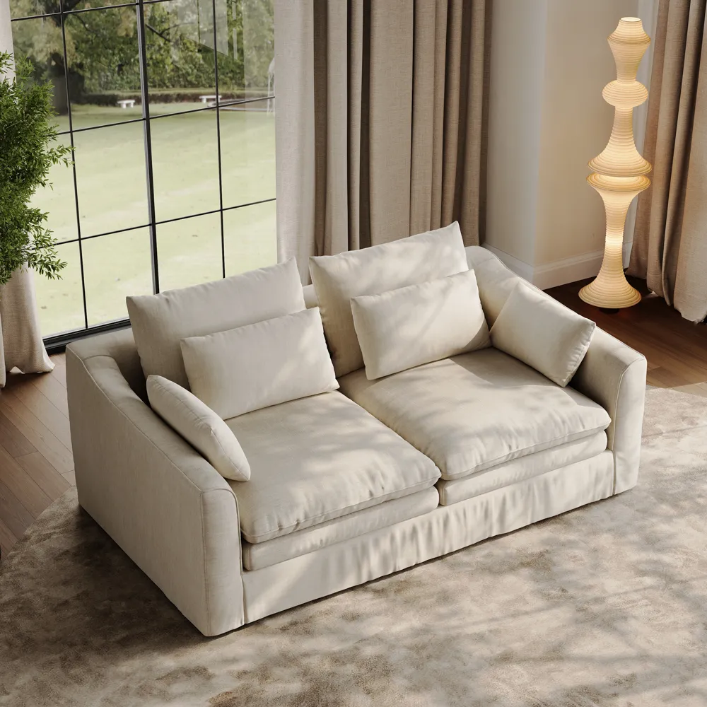 Deep seat cream fabric sofa with feather-filled cushions and removable covers, pet-friendly and ideal for cozy everyday living spaces.