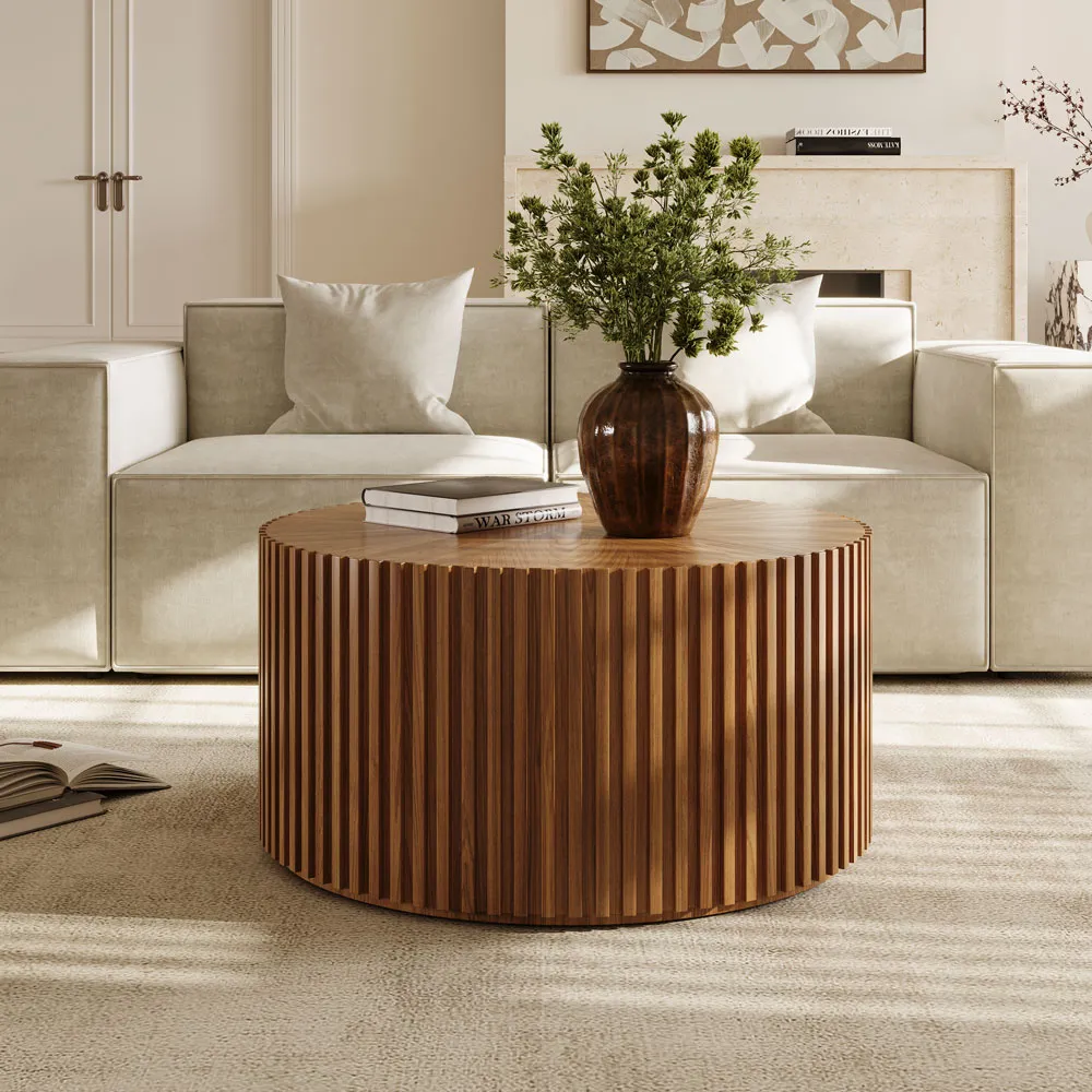 Modern round solid wood coffee table with striped texture design, warm and natural, ideal for contemporary home interiors.