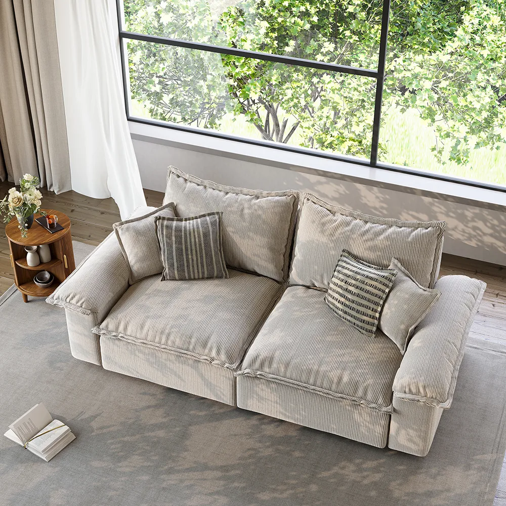 ● Beige Corduroy Modular Sofa with Ottoman featuring plush cushions and removable covers, styled in a bright modern living room with large windows and natural light