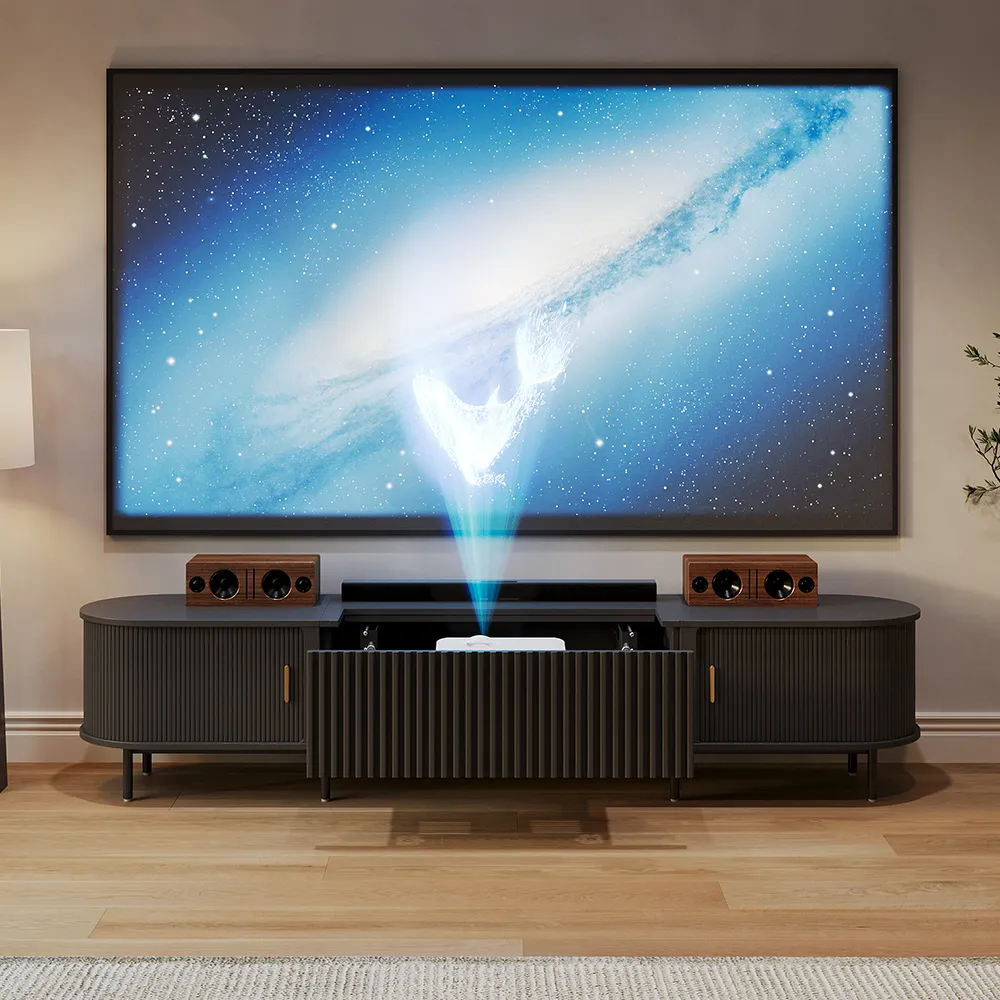 Black modern TV stand with built-in projector drawer and vintage speakers, projecting onto a cosmic blue screen.