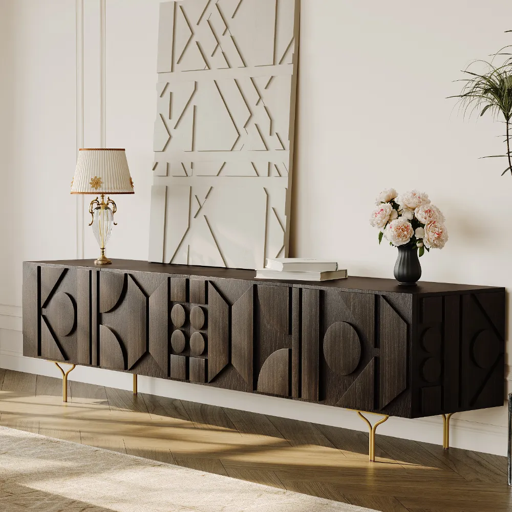 Dark wood mid-century modern TV stand with geometric carved doors and gold legs, styled with flowers and abstract panel decor
