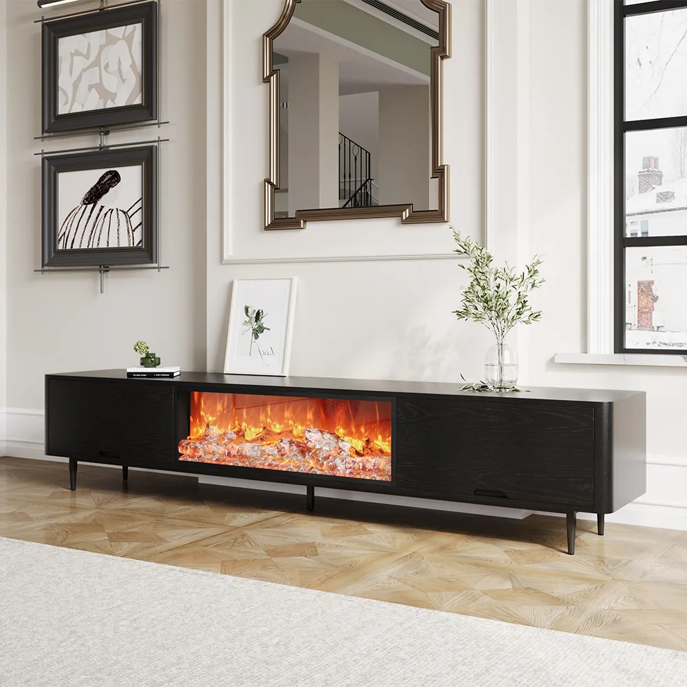 Sleek black electric fireplace TV stand with LED flame effects in a modern classic interior setting with hardwood floors and artwork