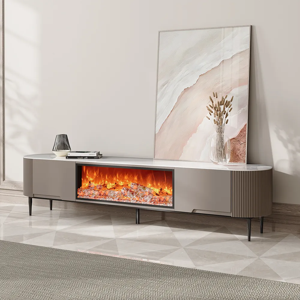 Contemporary electric fireplace TV stand with curved edge design and LED flame display, styled with modern decor and art piece