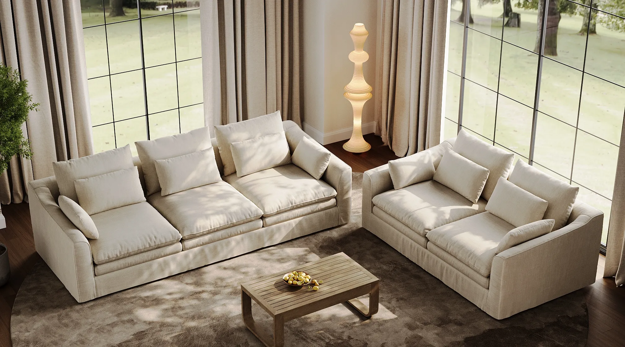 Light-filled living room with matching cream-colored sofas arranged in an L-shape, featuring oversized cushions and a modern wooden coffee table.