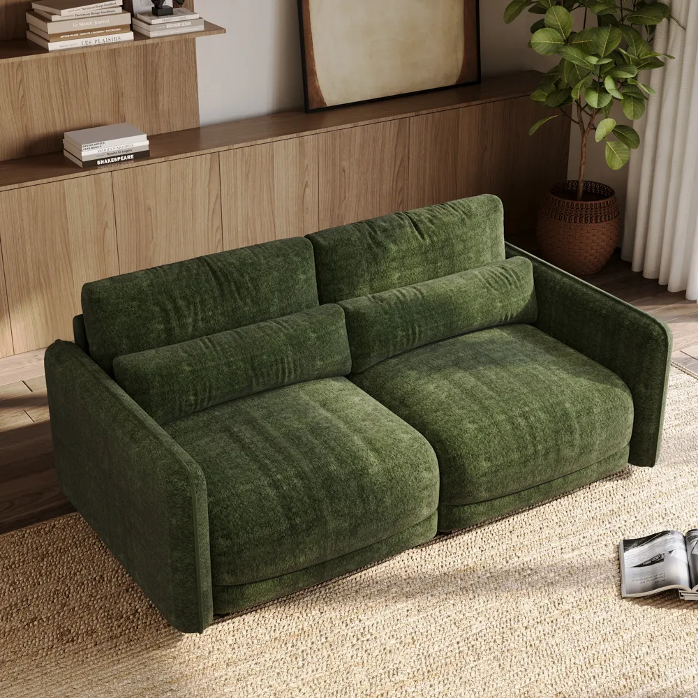 Green chenille 2-seater sofa with high-resilience foam and lumbar pillows in a sunlit minimalist living room