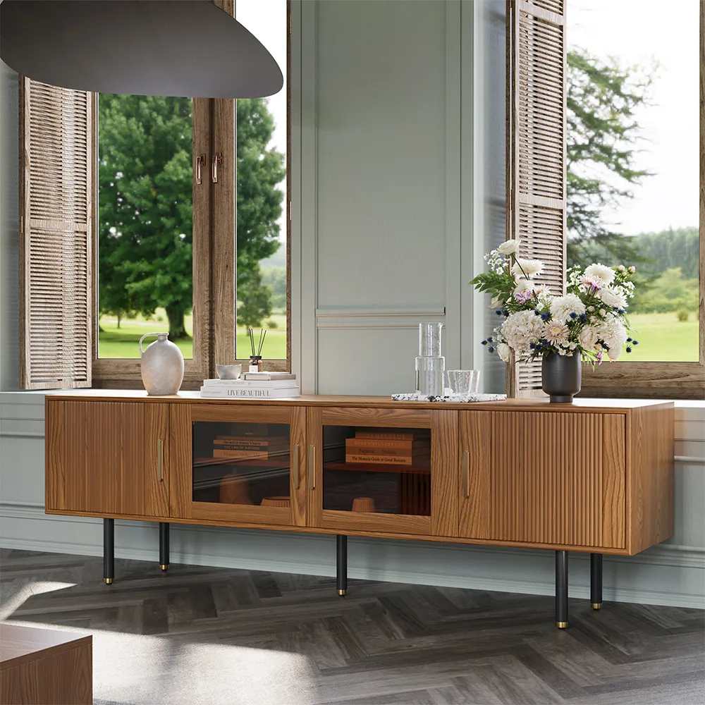 Minimalist wood coffee table and slatted floating sideboard in a light-filled room with modern decor and garden views.