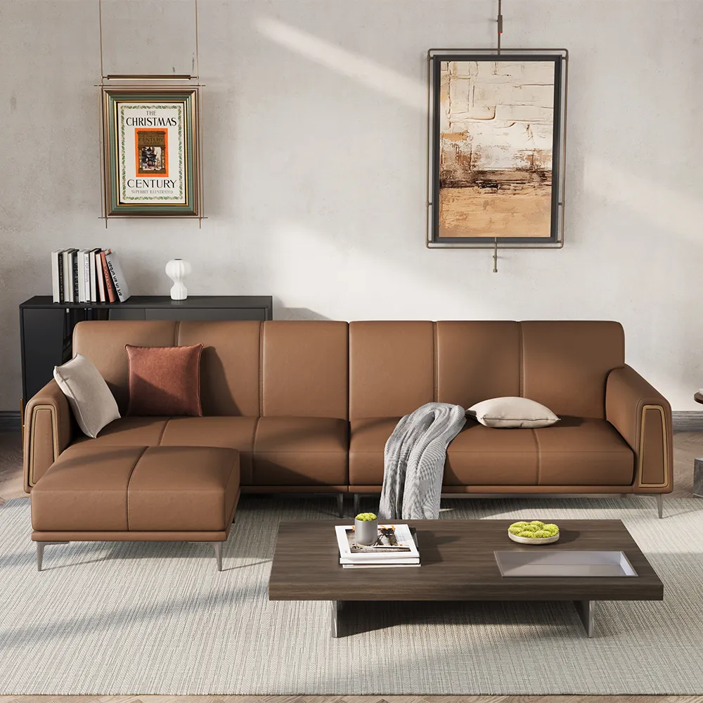 Modern minimalist cowhide four-seater leather sofa with sleek silhouette and corner chaise in elegant living room with neutral decor