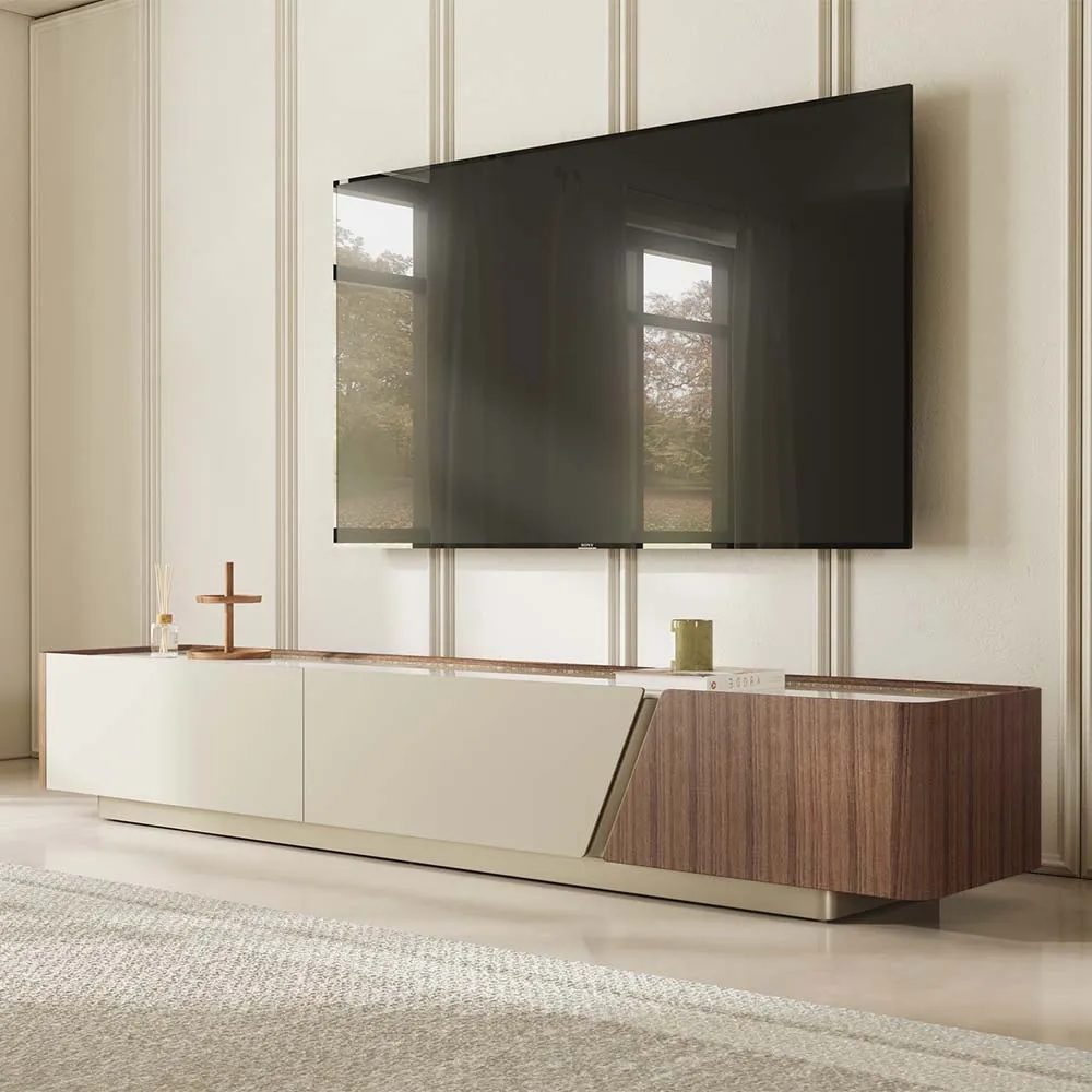 Modern minimalist TV stand with glossy beige and walnut finish, placed under a mounted flat-screen TV in a bright living room