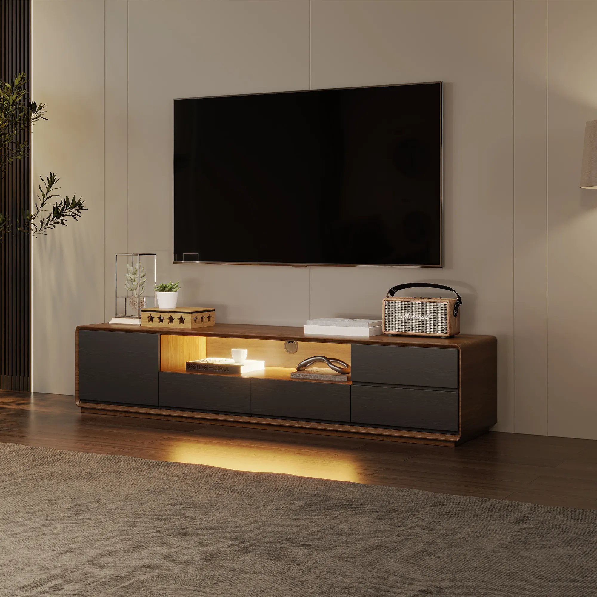 Contemporary TV stand with LED-lit open shelf and matte black drawers, placed beneath a mounted flat-screen TV in a dark wood-accented room