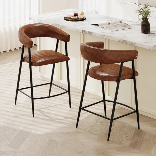 Pair of brown PU leather bar stools with curved backs and black metal legs, placed next to a marble breakfast counter.