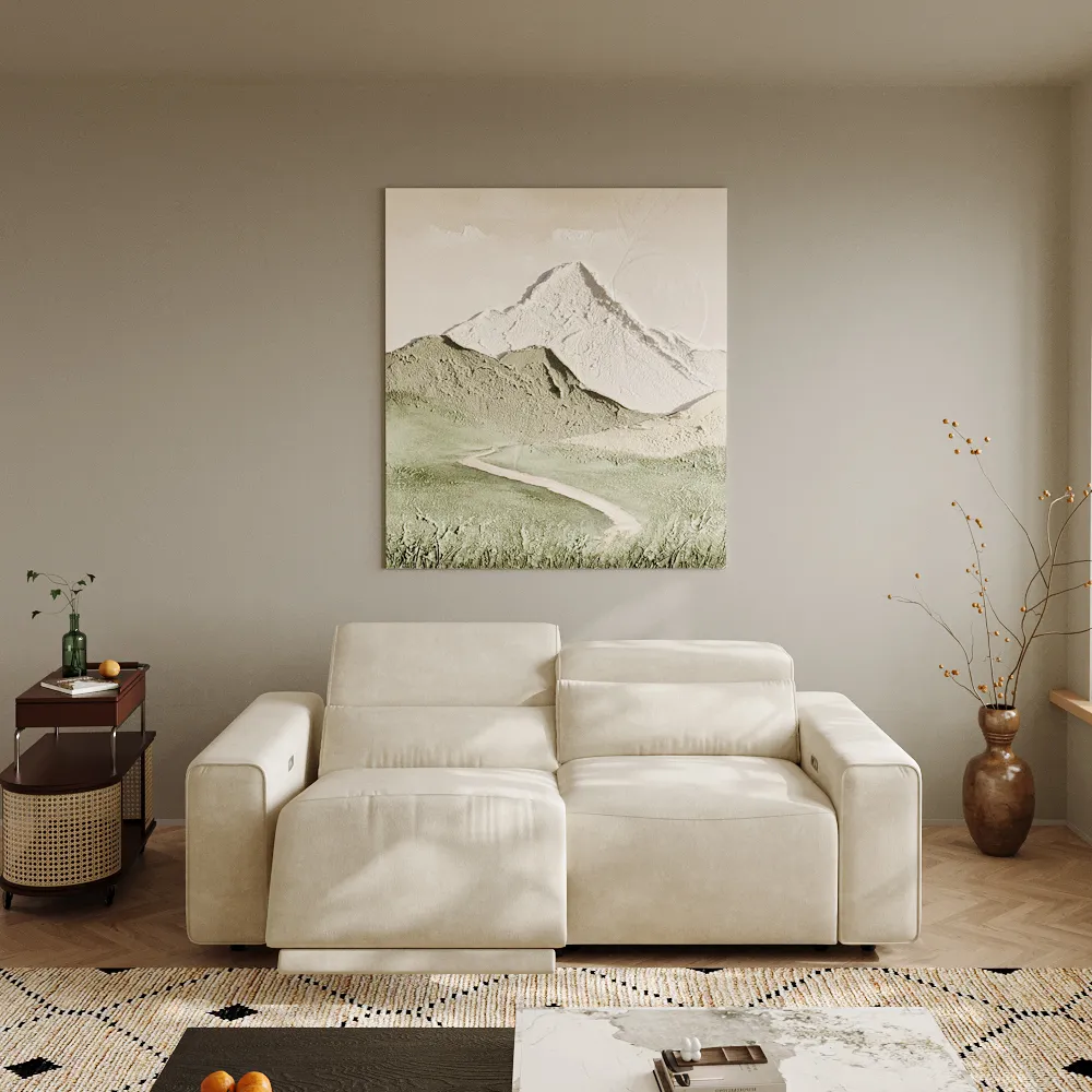 Contemporary beige power reclining sofa with adjustable backrests, placed in a bright room with neutral decor and a nature-inspired painting.
