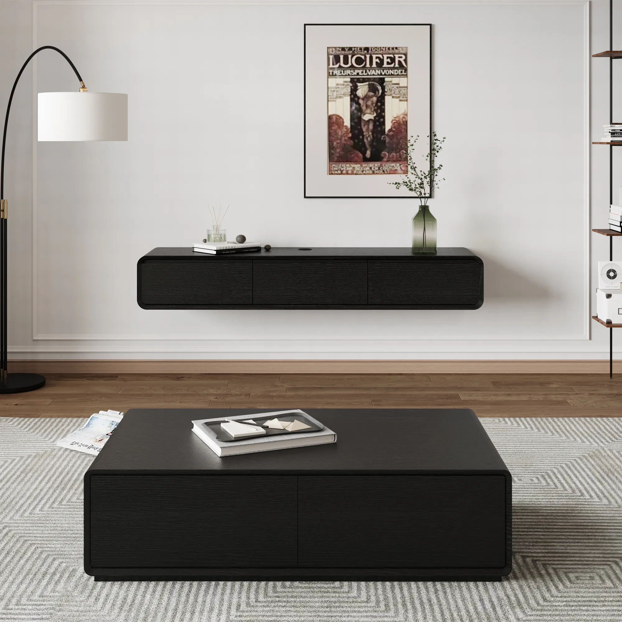 Minimalist black wood floating TV stand and matching black rectangular coffee table in a sleek monochrome living room