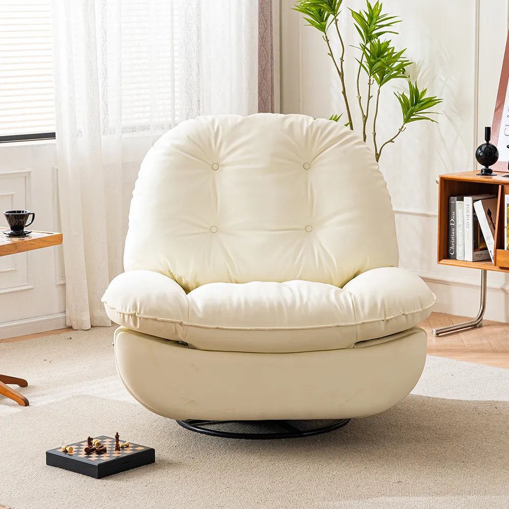 Plush cream-colored swivel lounge chair with button-tufted backrest and curved silhouette, styled in a cozy sunlit living room corner with bookshelf and indoor plant