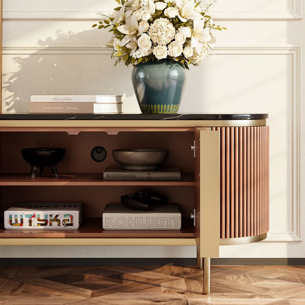 1. Close-up of fluted wood cabinet interior with black stone top, showcasing shelves with books, bowls, and a flower vase on top