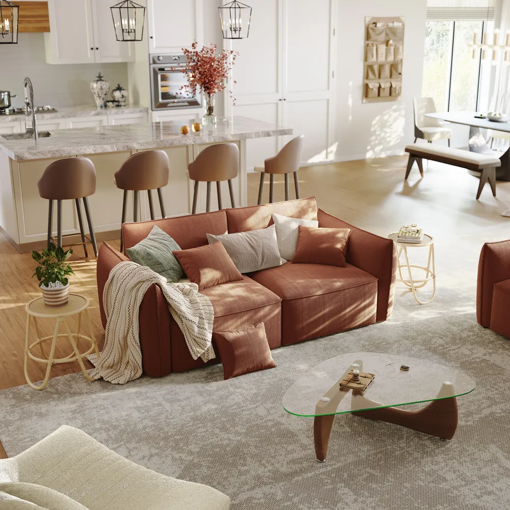 Deep sleeper-style cloud sectional sofa in pet-friendly taupe fabric with adjustable back cushions and solid wood legs, styled in a warm open-concept living space.