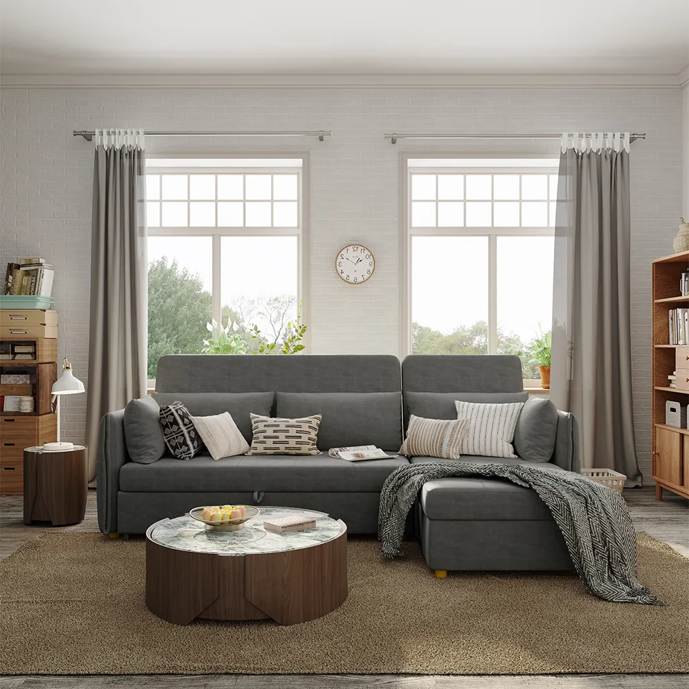 A modern gray sofa bed in a chic, sunlit living room