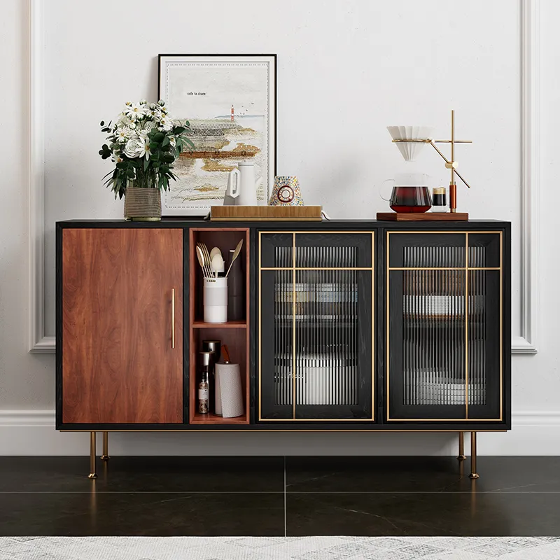 Modern mid-century sideboard with black and brass frame, perfect for eclectic or contemporary spaces