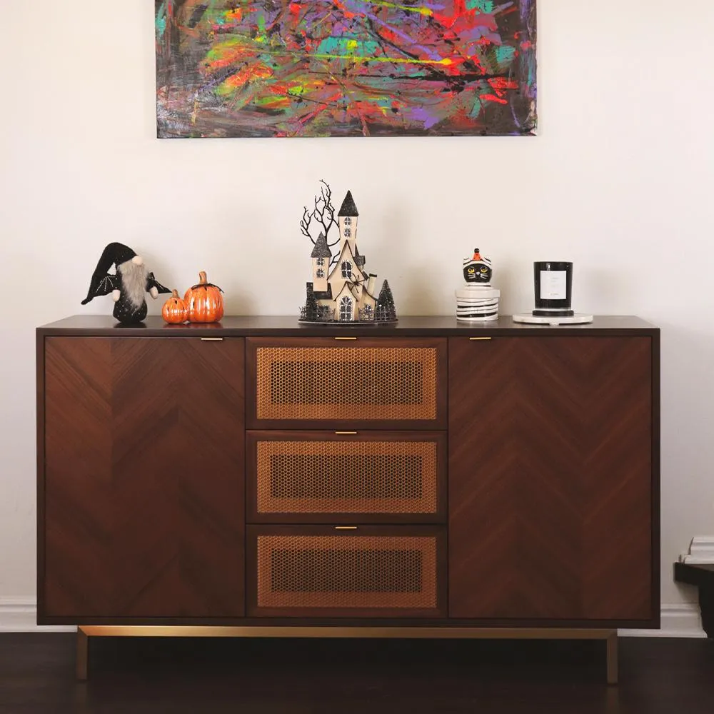 Mid-century modern sideboard with chevron wood and brass-rattan drawers, ideal for refined interiors