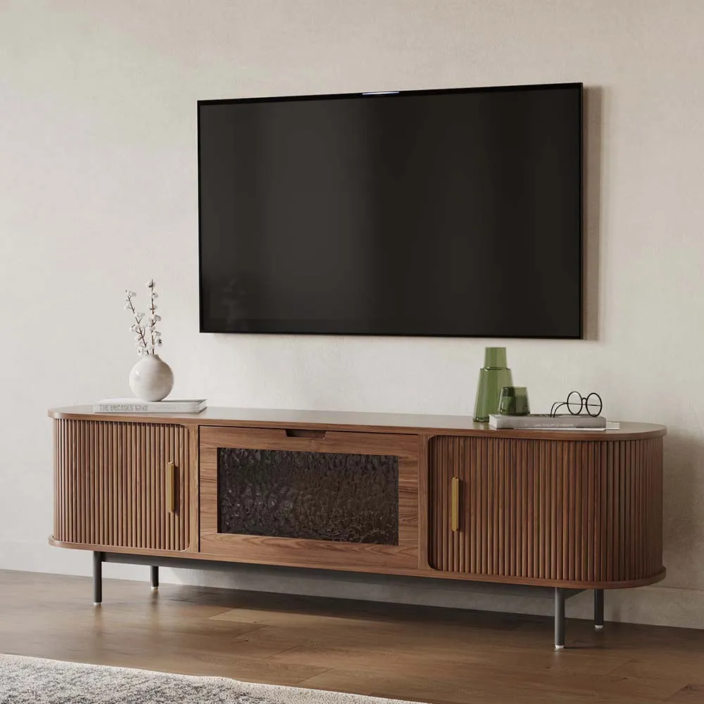 Close-up of tambour door TV console with water-textured glass center and fully assembled wooden cabinet