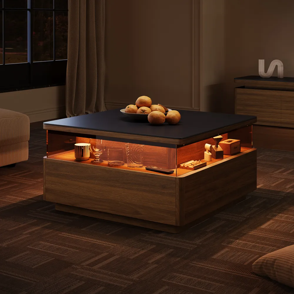 The square mid-century modern coffee table with a black sintered stone top and integrated LED lighting, shown in a cozy living room.