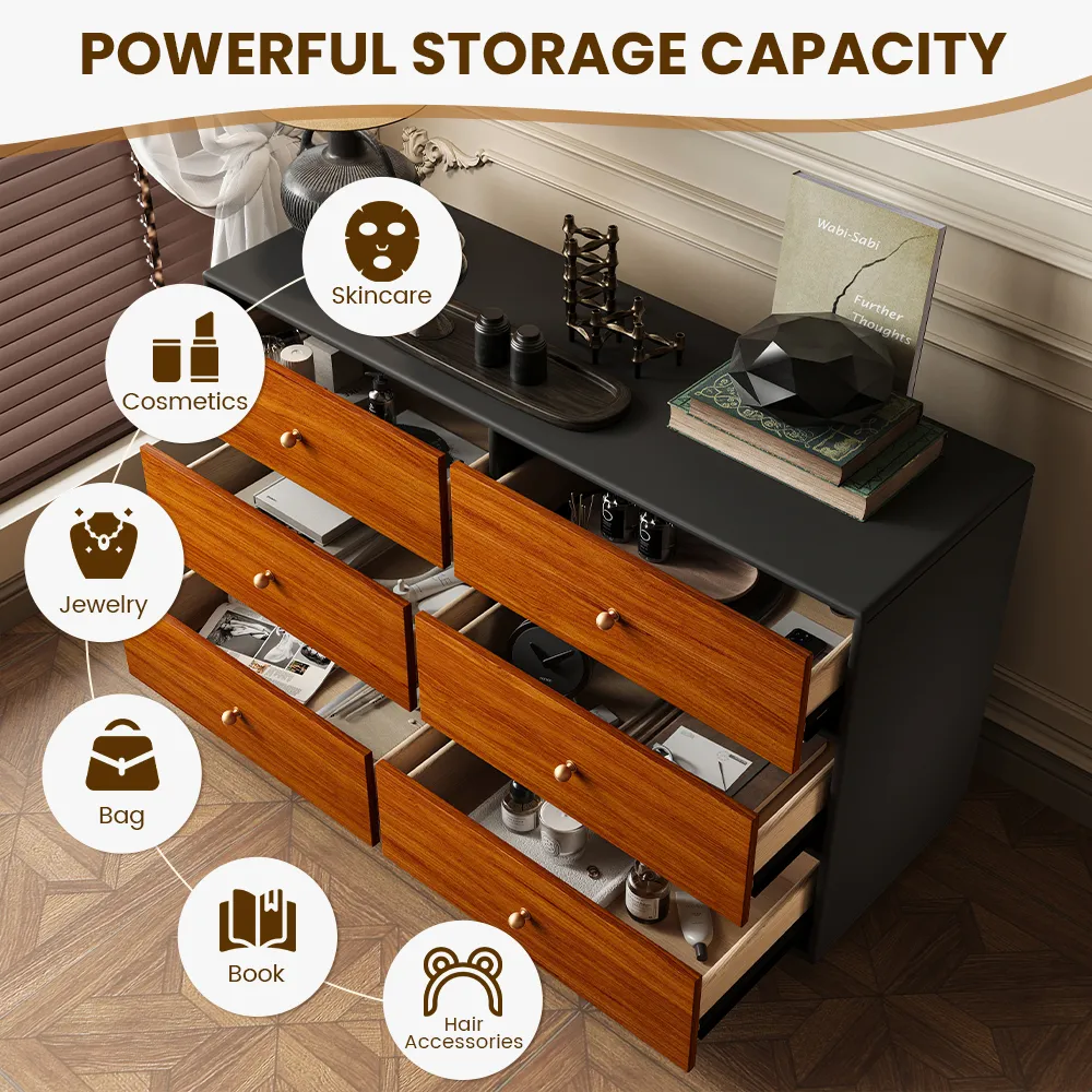 A neatly organized dresser drawer showing clothes stored vertically using the file-folding method for easy visibility. 