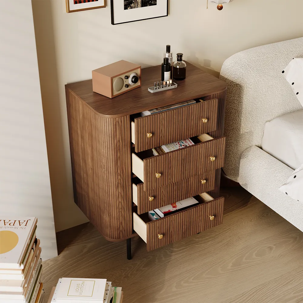 The tall, 4-drawer mid-century dresser standing neatly in the corner of a well-organized bedroom.