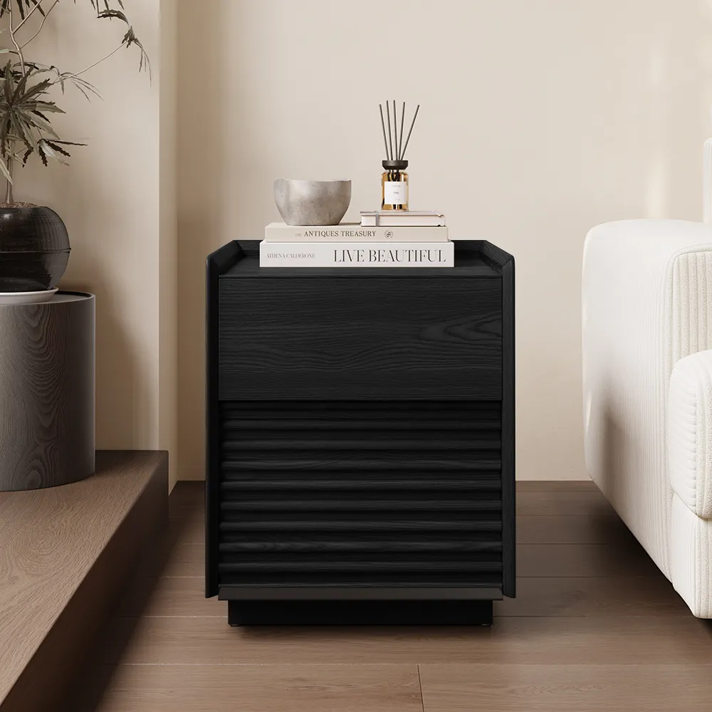Mid-century modern black side table with drawer and ribbed design