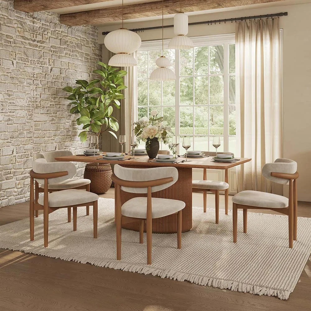 Modern dining room with a mid-century 7-piece wood set featuring a rectangular table and curved-back chairs, styled in a bright and open space.