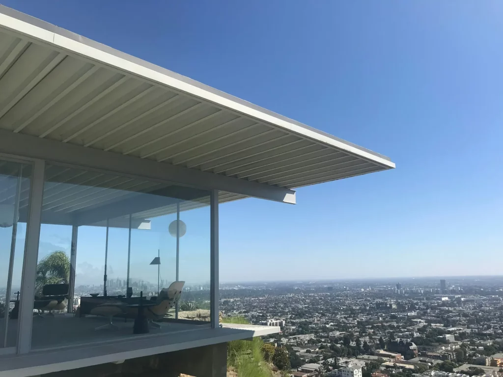 Mid Century Modern Exterior Home with Flat Rooflines and Floor-to-Ceiling Glass Walls