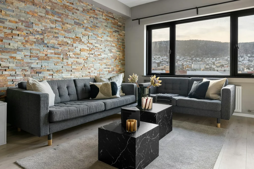 Modern Grey Sofa Living Room with Colorful Textured Stone Accent Wall