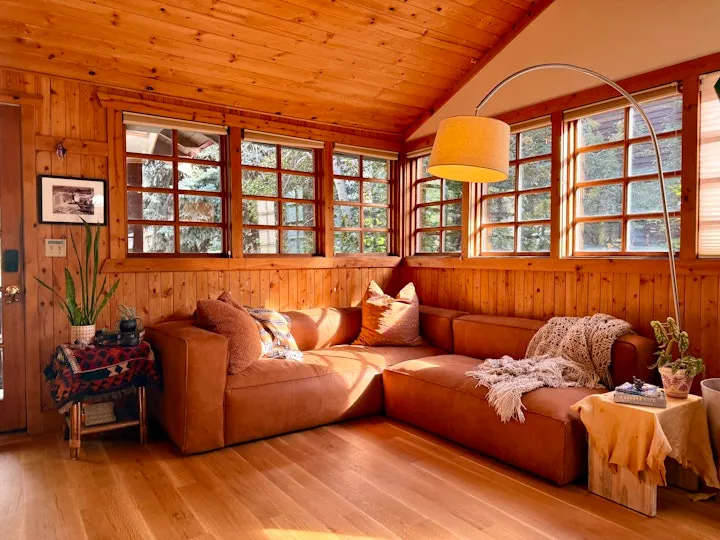 Rustic Cabin Space Showcasing The Most Comfortable Sectional Sofa With Chaise and Throw Blankets
