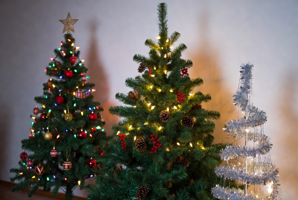 comparison of slim pencil and tabletop christmas trees for small living rooms