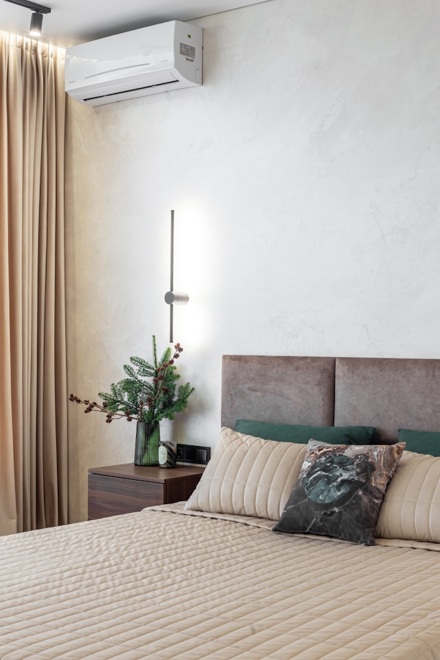 modern bedroom with dark accent furniture