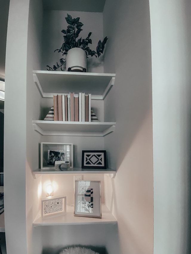 white wooden wall mounted shelf