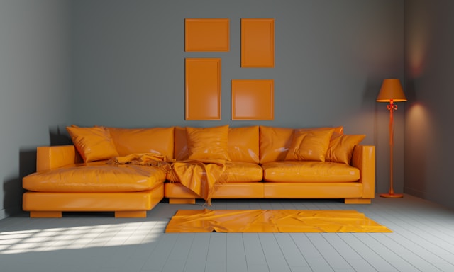 Bright orange sectional sofa with matching wall art and floor lamp in a modern living room