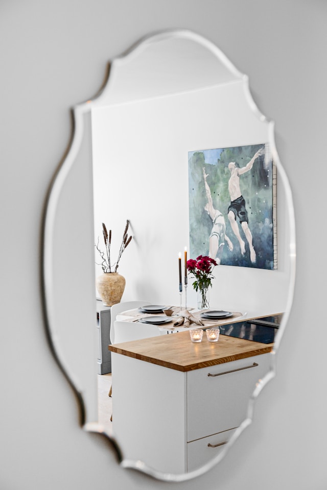 Clean mirror and surface shot to illustrate correct hanging height and scale.