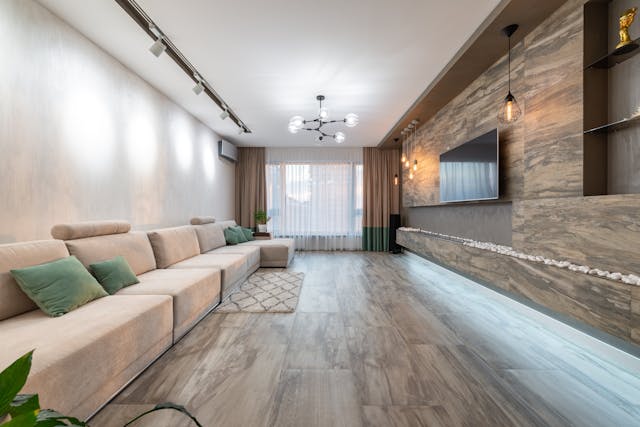 Extra-long modern sofa in a spacious living room with neutral decor