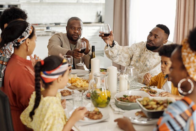 Family lunch at a large dining table used for meals, homework and daily activities