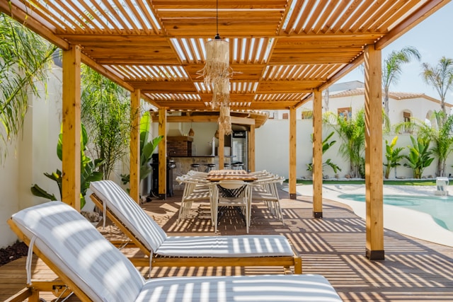 Outdoor patio with lounge chairs and dining table