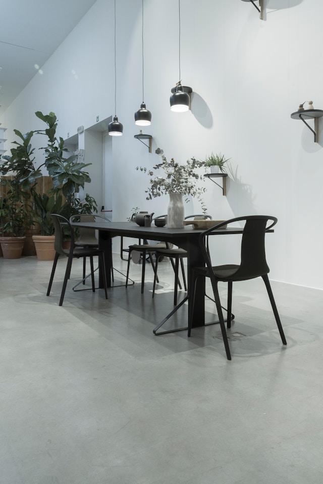 black wooden table and metal chairs