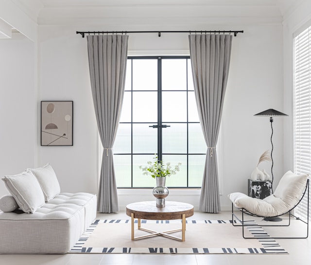 living room with neutral color scheme and minimalist decor