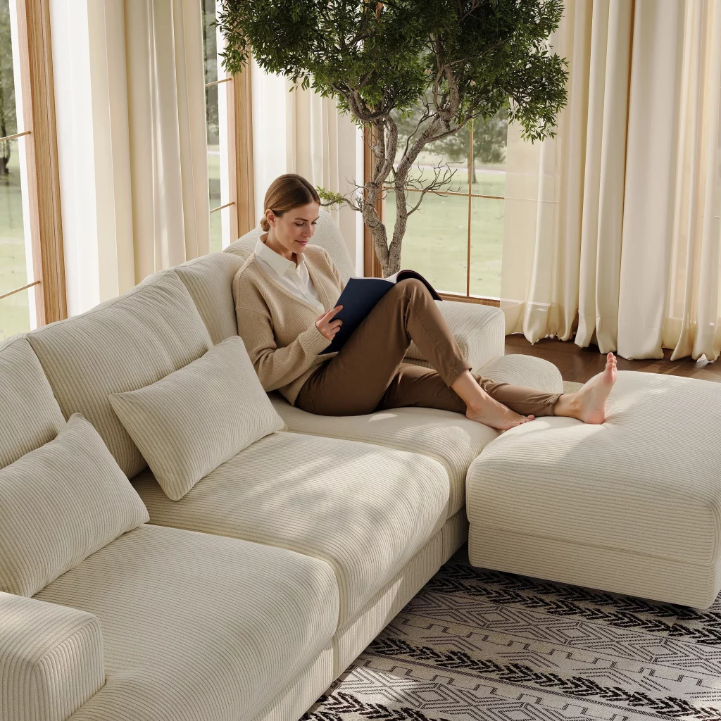 a woman sitting on a sectional  Modular Sofa