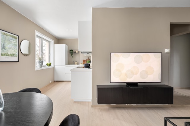 A living room filled with furniture and a TV stand