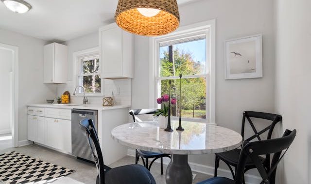 Cozy modern kitchen with small dining table – great for city apartments