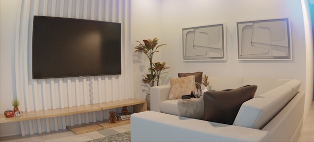 Modern living room with sofa, tv stand, and artwork