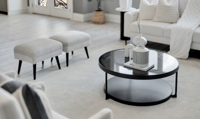 Modern living room with white sofa and round coffee table