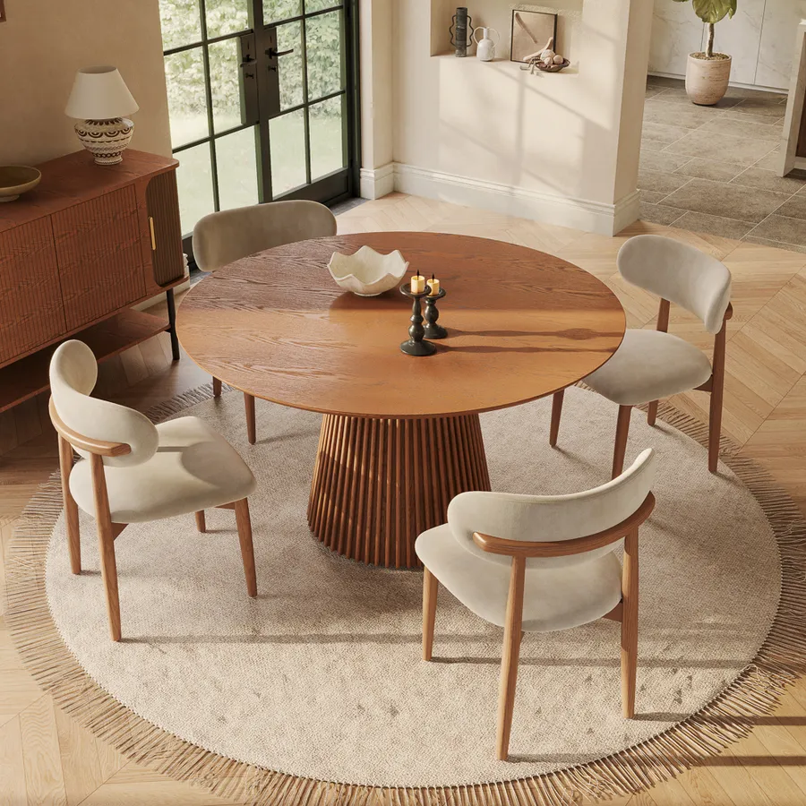Silva-Round wood Dining Table with four dining chairs near a wood tufted storage cabinet in a minimalist dining room