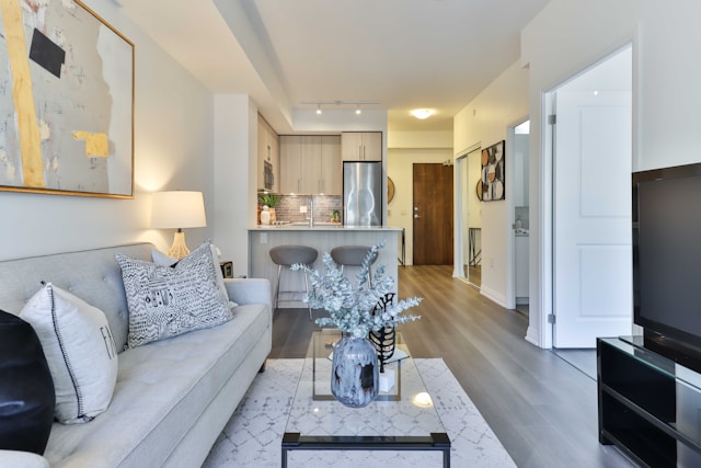 a living room with a couch and a glass coffee table