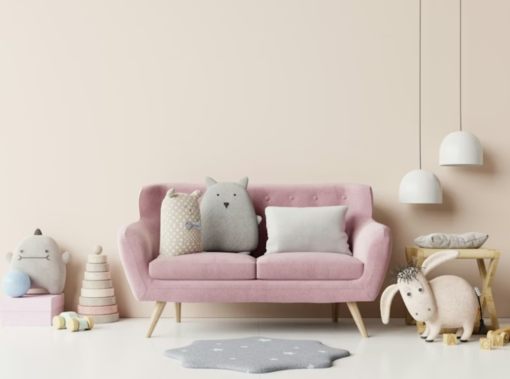 pink loveseat sofa in children's room